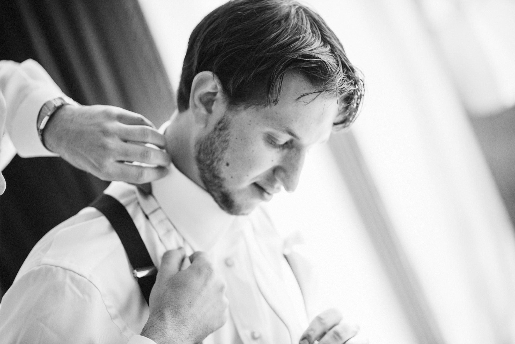 groom getting ready at langham,