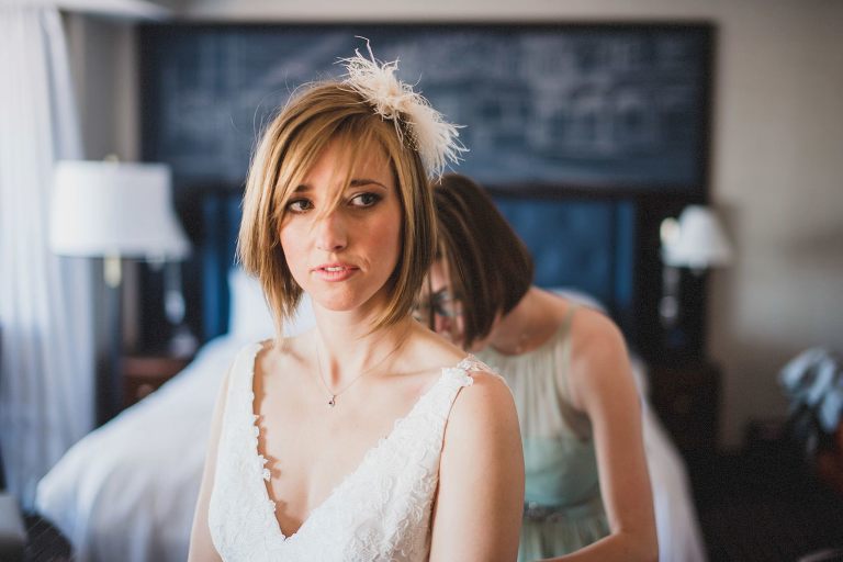 bride getting ready at courtyard brookline,