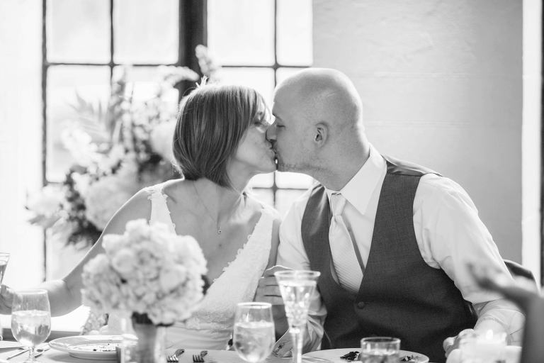 bride and groom kiss at alden castle,