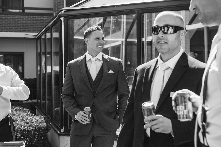 groomsmen drinking before wedding,