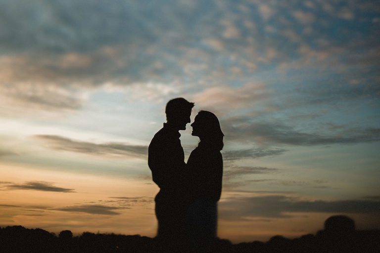 silhouette against sunset in newburyport,