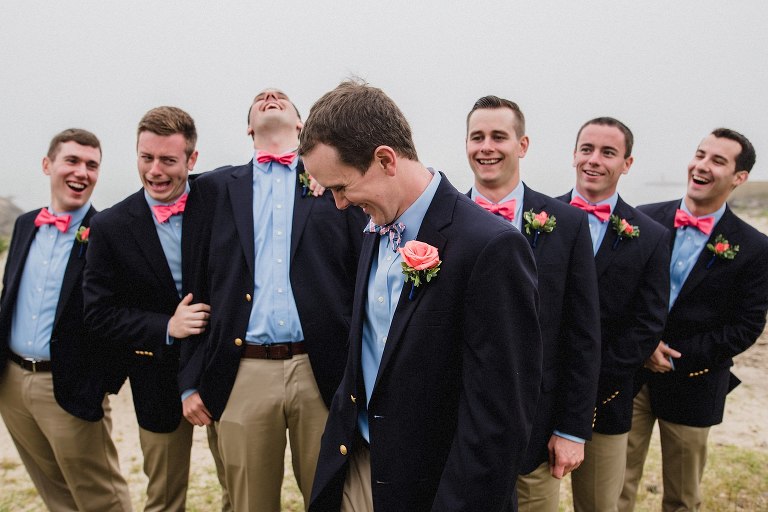 groomsmen laughing at lighthouse inn,