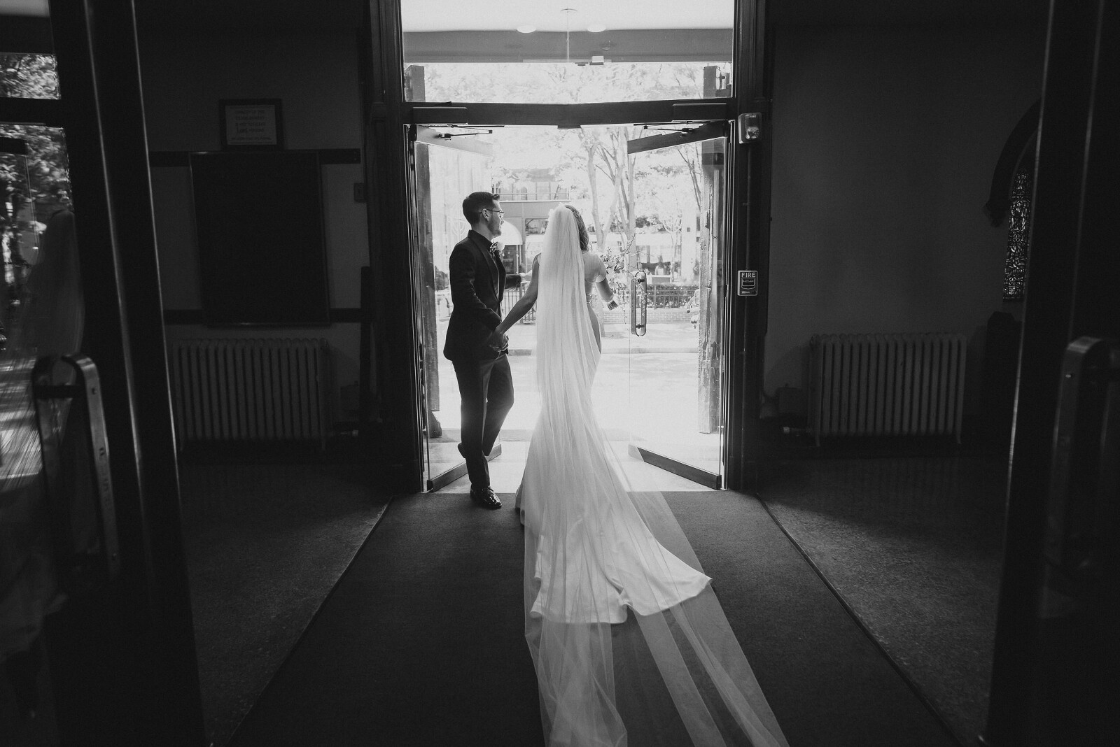 Bride and groom dramatically leaving ceremony